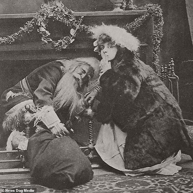 7564524-6507561-A_bedraggled_version_of_Santa_Claus_crawls_into_the_chimney_in_t-m-156_1545134...jpg
