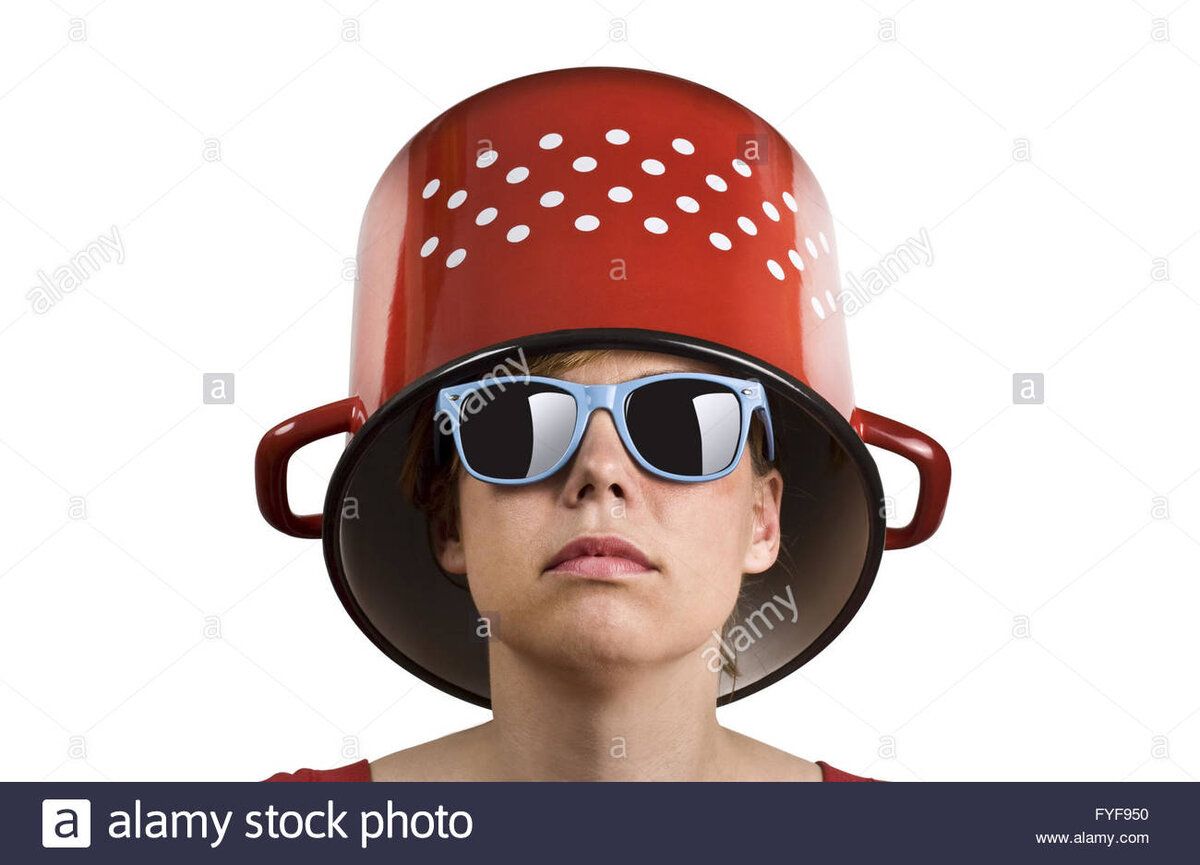 young-woman-with-blue-sun-glasses-and-a-red-cooking-pot-with-dots-FYF950.jpg