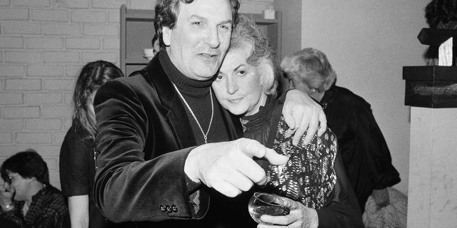 In this April 28, 1981 file photo, Actor Danny Aiello hugs actress Beatrice Arthur at a party following their opening performance in Woody Allen's play, The Floating Lightbulb, in New York.