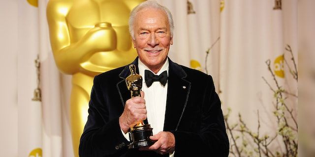 Christopher Plummer in 2012, poses with his Oscar for Best Supporting Actor Award for his role in 'Beginners.'