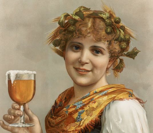 A woman wearing a crown of hops, holding a glass of beer