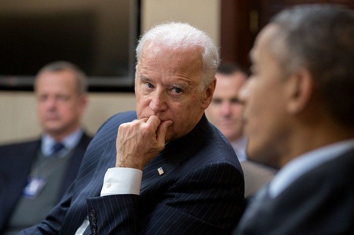 Former Vice President Joe Biden listening to former President Barack Obama during a White House meeting. 
