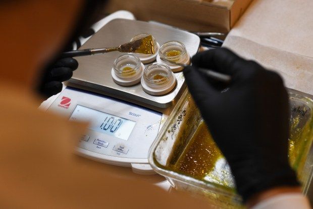 1g of marijuana concentrates are weighed ...