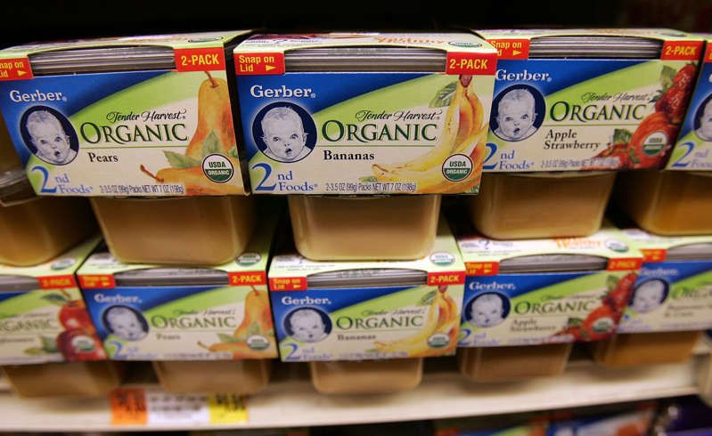 Gerber organic baby food products are seen on a supermarket shelf April 12, 2007 in New York City. Nestle SA, the world's largest food company, purchased Gerber, the largest baby food producer in the U.S., for $5.5 billion. Photo by Mario Tama/Getty Images