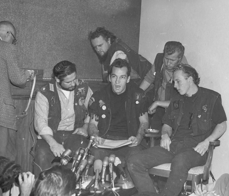 In 1965, the members of the Oakland Hells Angels chapter, from left are: Cliff Workman, treasurer; Mr. Barger, president; Tiny Walter, sergeant at arms; Ron Jacobson, secretary; and Tom Thomas, vice president, seated far right.