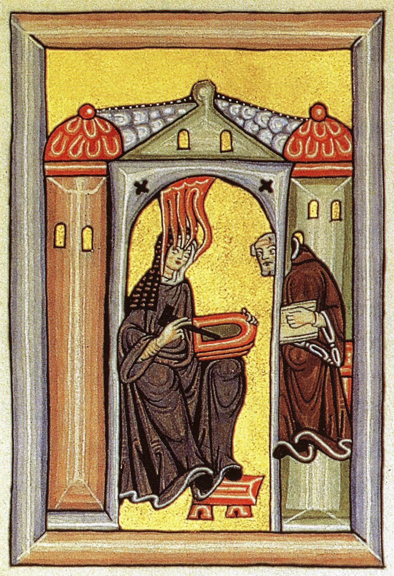 An illustration from one of Hildegard's visionary texts, depicting her receiving a vision and dictating to her scribe.