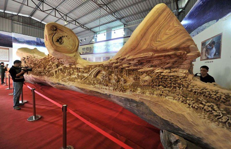 worlds-longest-wooden-carving-was-made-from-a-single-tree-trunk-zheng-chunhui-5.jpg