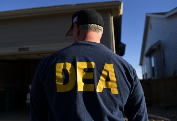 Members of the Drug Enforcement Administration ...