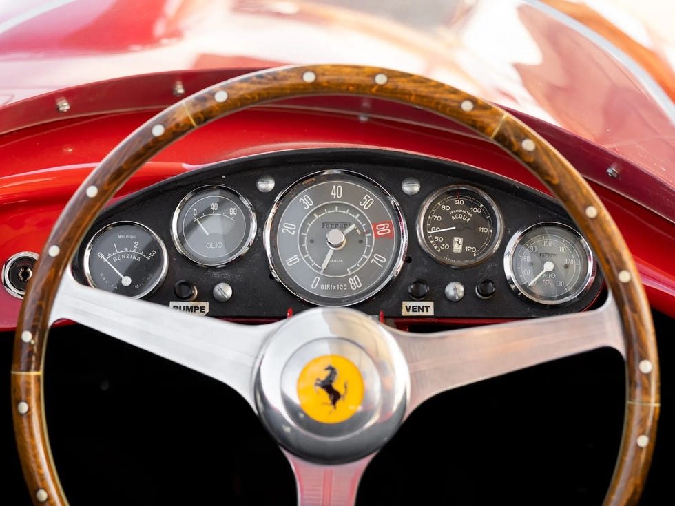 The wooden steering wheel and speedometer of a 1955 Ferrari 410 Sport Spider, once driven by legendary race car driver Carroll Shelby.